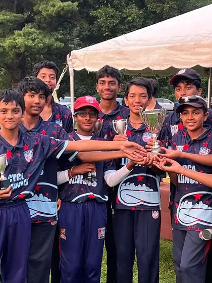 A close-up of the CYCA Bears holding their trophies, proud of their hard-fought tournament.