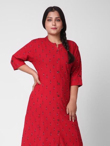 A three-quarter shot of the model in the red kurti, providing another angle for a comprehensive product gallery.