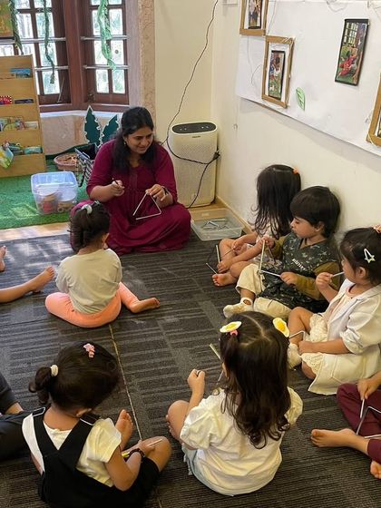 Exploring the triangle is a great lesson in listening. The children learn to hold it carefully and strike it just right to hear its beautiful, ringing sound.