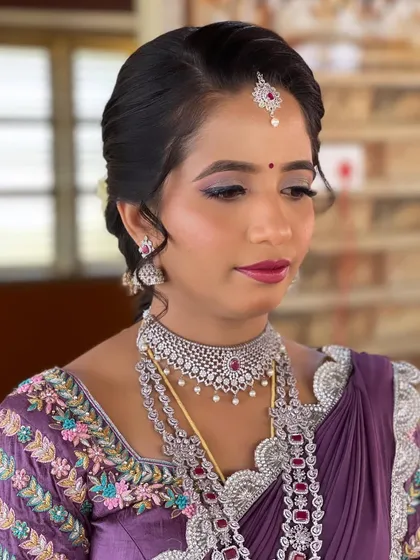 Another angle of Nayan's reception makeup, highlighting the flawless base and the beautiful shimmer on her eyes.