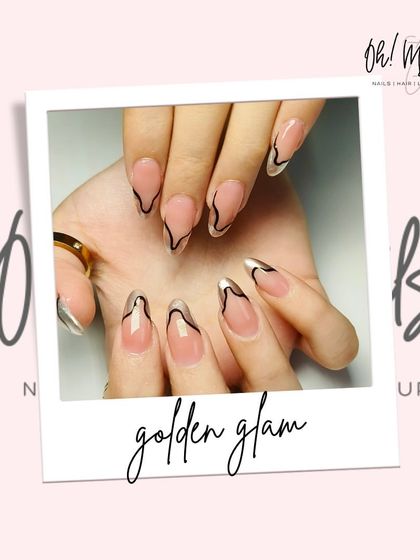 Golden glam. This abstract design combines a sheer neutral base with bold, free-flowing lines of black and gold chrome for a modern and artistic statement.