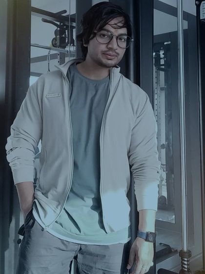 A relaxed pose at the gym. It's important to feel comfortable and confident in your workout environment.