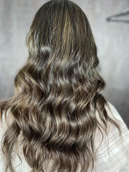 Another view of the ash blonde look, showing the seamless integration of cool tones.