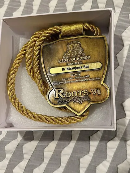 A Medal of Honor presented to me for my role as faculty at the Roots-VI conference. This recognition reflects my commitment to teaching the next generation of dermatologists.