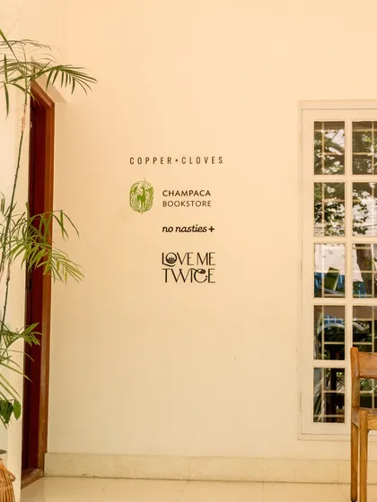 I’ve brought together some of my favorite local and conscious brands right here in the cafe. You can browse thoughtful reads from Champaca Bookstore, find sustainable fashion from No Nasties, or discover treasures at Love Me Twice thrift store. It’s all part of the experience.