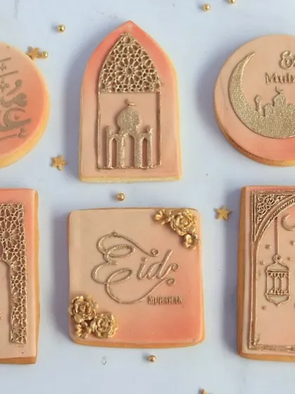 A collection of my hand-decorated Eid cookies, showcasing various designs with elegant gold detailing. These vanilla butter cookies are almost too beautiful to eat.
