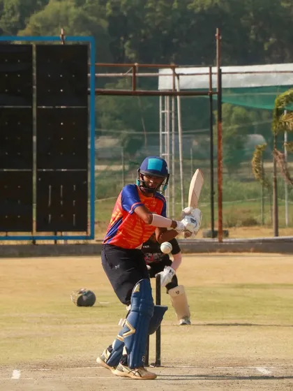An ODI match in full swing. Here, one of our batsmen is focused at the crease, ready to build an innings and put pressure on the opposition.