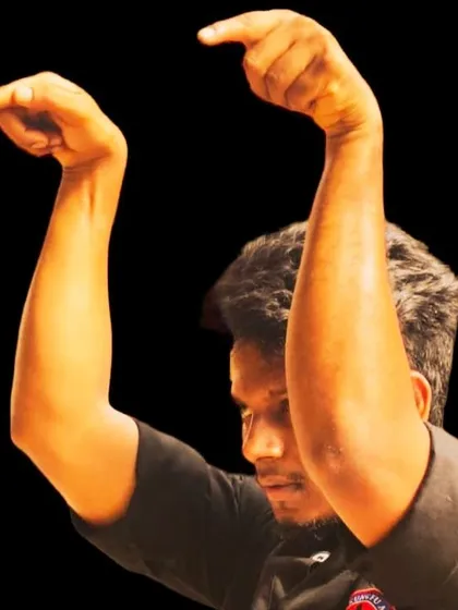 A demonstration of the Praying Mantis style. This advanced Kung Fu technique is known for its unique hand forms, which mimic the rapid and precise grabbing motions of the insect.