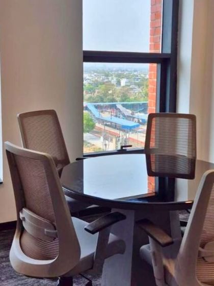 A meeting room with a view in our new Delhi office, offering a bright and professional space for client consultations.