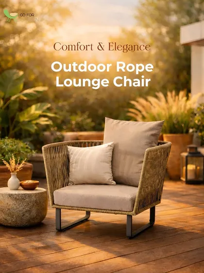 A perfect example of comfort meeting elegance. This is our outdoor rope lounge chair, set against a beautifully landscaped backdrop. Notice the intricate rope weaving and the plush, deep cushions, which create an inviting spot to relax. The sturdy aluminum frame ensures it's as durable as it is stylish, ideal for any modern patio design.