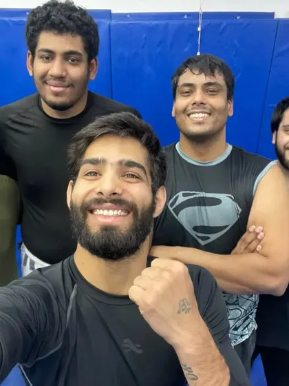 Posing after a tough No-Gi class. This training is excellent for building functional strength and endurance.