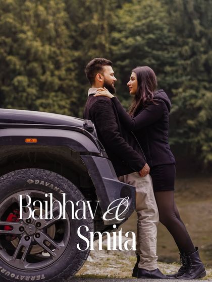 A powerful and stylish pose with the couple and their vehicle, creating a modern and adventurous pre-wedding portrait in Manali.