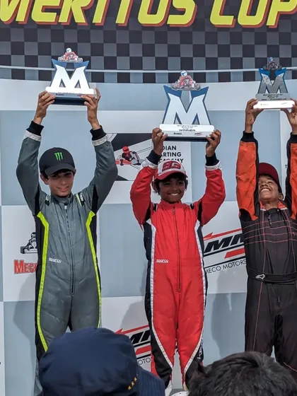 A view from the crowd as our young champion Rishik celebrates his first podium finish at the Meritus Cup Round 3, a significant milestone in his racing career.