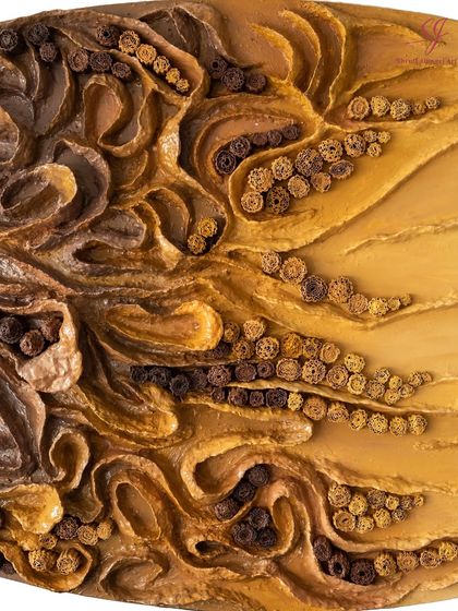 A close-up of the intricate textures in "The Enchanted Abyss." These details are made from upcycled paper, transforming discarded material into something divine.