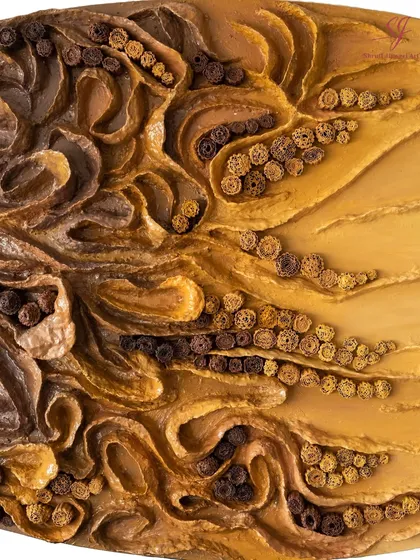 A close-up of the intricate textures in "The Enchanted Abyss." These details are made from upcycled paper, transforming discarded material into something divine.