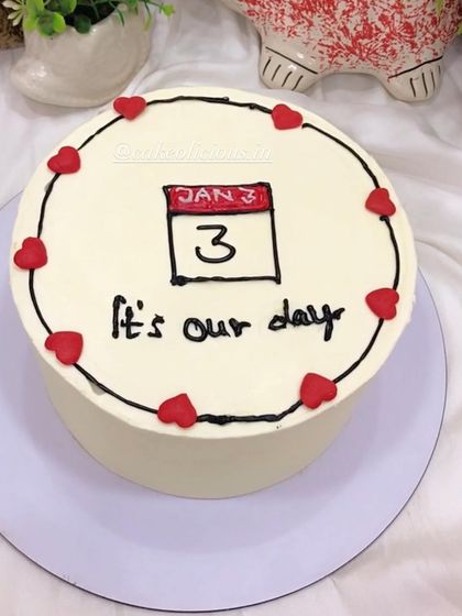 Another version of my popular calendar cake, this one for a 3rd of January anniversary. This cutesy design is a chocolate truffle cake finished with smooth white ganache.