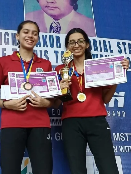 Our champions Vidhi Shah and Ananya Chande together, showcasing their haul of trophies and medals from the state ranking tournament. They are two of the brightest talents in our academy.
