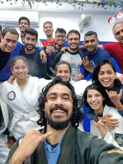 This is our tribe. A candid moment with our BJJ Familia after a rewarding class. We train hard, support one another, and build bonds that extend far beyond the gym walls.