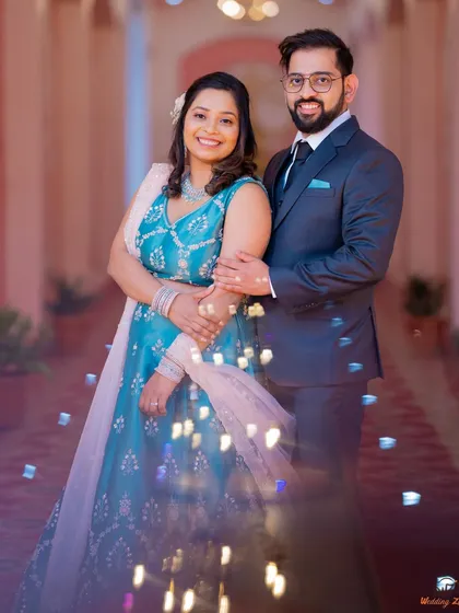 A happy and bright portrait of Saili and Jayant. The bubbles add a playful and celebratory element to their engagement shoot.