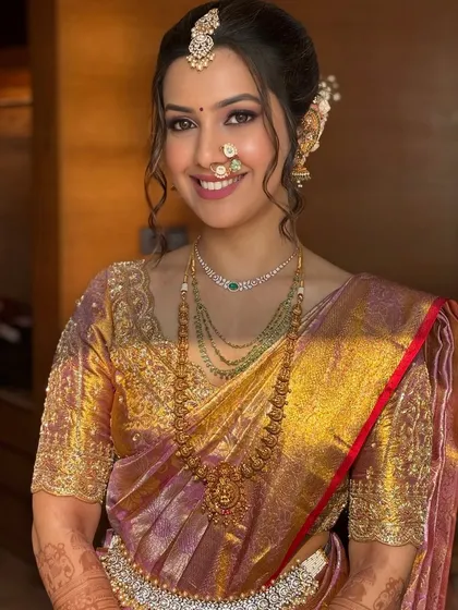 This is the essence of a royal Maharashtrian bride, a look we will master together in the course. This close-up shows the flawless HD makeup, soft contouring, and defined eyes that create a radiant glow, perfectly complementing traditional jewelry.