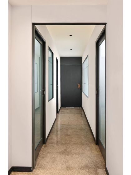 These images provide further views and details of the Project Rooftop and Noir Oak offices. They showcase everything from conference room details and corridor views to custom furniture and the play of natural light, illustrating my comprehensive approach to workspace design.