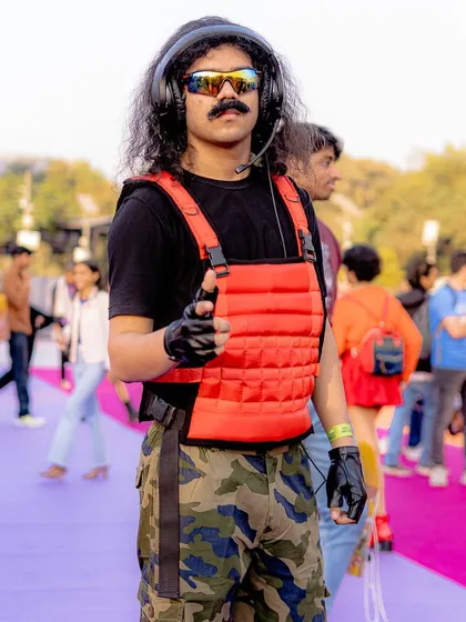 Another angle of the Dr. Disrespect cosplay, showing his confident pose. Event photography is about capturing these character-driven moments.