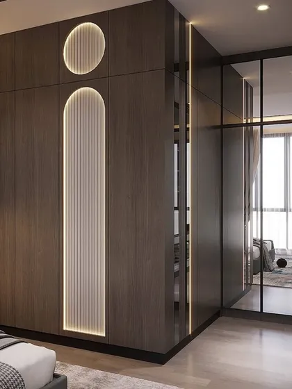 This 3D render showcases a dark wood wardrobe with integrated LED lighting in its paneling. The design also features a full-length mirror seamlessly built into the wardrobe structure.