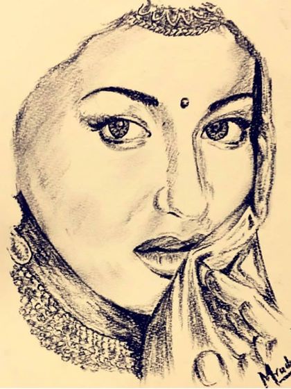 A charcoal trial of a Rajasthani bride. I was exploring how to convey emotion and tradition through the eyes and the partial covering of the face.