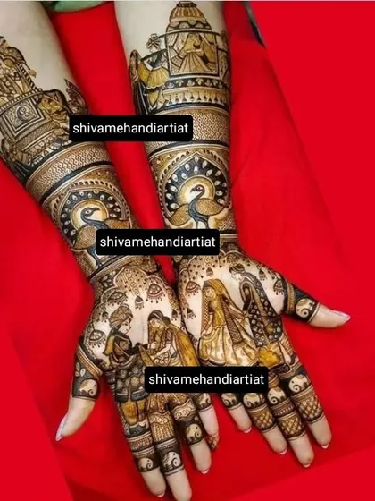 This design captures a tender moment between the couple during the varmala ceremony. The forearms are adorned with peacock and doli motifs.