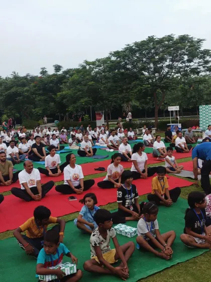 Yoga is a practice for everyone, and I love seeing families and children come together to share this experience. This image is from a large outdoor community session, with my youngest students right at the front, fully engaged in the practice. It shows that the path to wellness can be a shared, joyful journey.