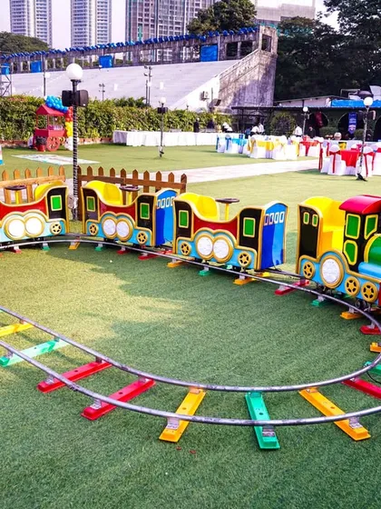 All aboard the party express! Our colorful mini-train ride takes children on a fun journey around the party grounds, perfect for outdoor venues and younger kids.