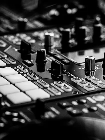 A black and white shot of my DJ controller. It highlights the technical side of my craft and the tools I use to mix and create my sets.