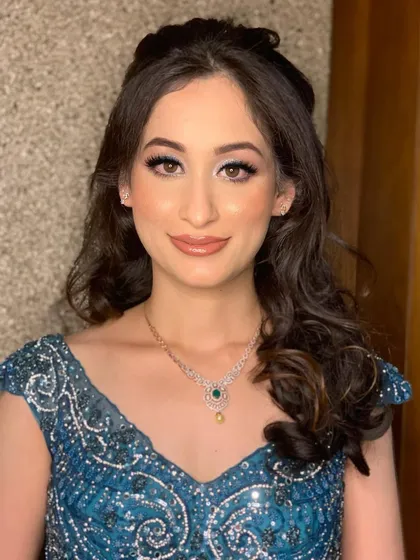 A shimmery swipe of blue for Rashvita’s engagement look. A fun and modern twist on classic engagement glam.
