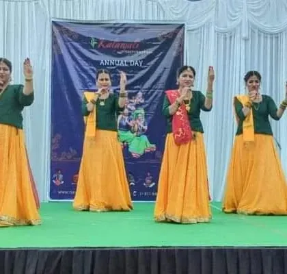Another beautiful formation from our Annual Day performance. This image showcases the expressive 'abhinaya' and coordinated 'hastak' (hand gestures) that bring a story to life on stage, reflecting the detailed training our students receive.