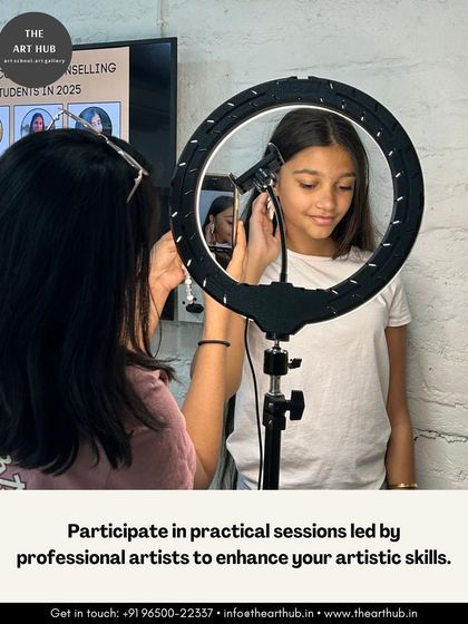 Practical, hands-on sessions are a core part of my teaching. Here, a student participates in a practical session on lighting for photography, led by a professional artist to enhance her skills.