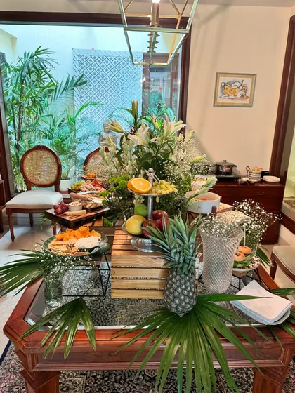 Another angle of our tropical-themed grazing table, showing the arrangement of fruits, cheeses, and crackers. The setup is designed to be both beautiful from afar and easy for guests to access.