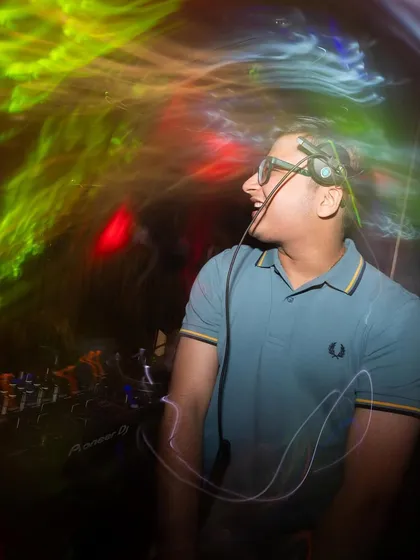 A creative shot with colorful light trails painting the air around me. This is what music feels like.