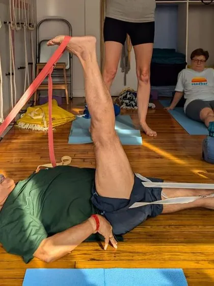 A reclining leg stretch, Supta Padangusthasana.
