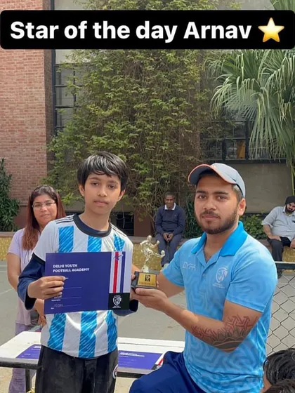 Arnav, the Star of the Day at the Intra DYFA Cup Edition 2, receiving his award.
