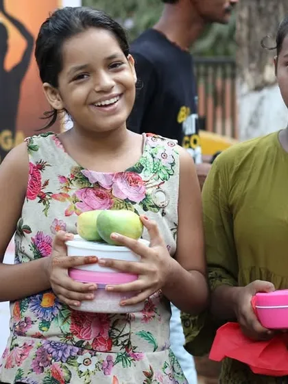 The happy faces of children receiving nutritious meals through our Annam Brahma program. Our goal is not just to combat hunger but also to spread compassion and nurture health in the community.