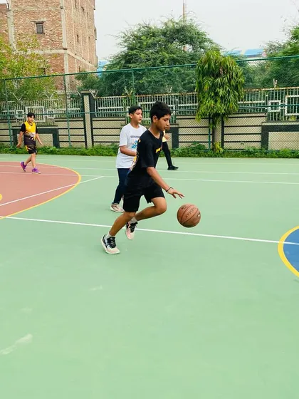 A player dribbles the ball during a morning session.