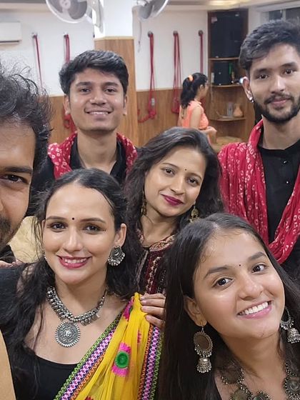 A selfie capturing the smiles and joy of our team and members during the Garba celebration.