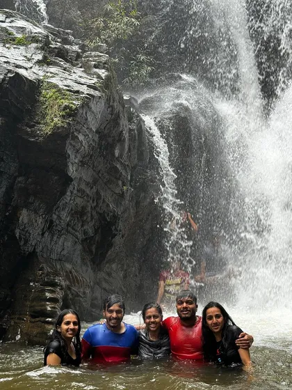A group of friends enjoying a refreshing dip in the waters of Bandaje.