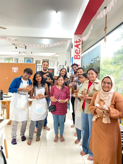 A group of participants with their finished clay pieces. It's always amazing to see the variety of creations that come out of a single workshop.