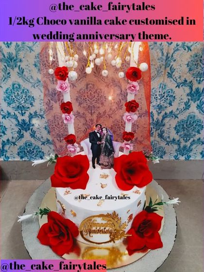 A full view of the 1kg Chocolate Truffle Vanilla cake with a wedding anniversary theme and lights.