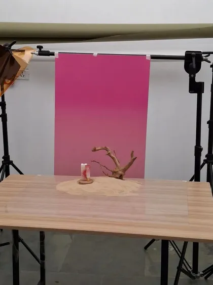 The full studio setup for our desert-themed shoot, showing the gradient backdrop and lighting.