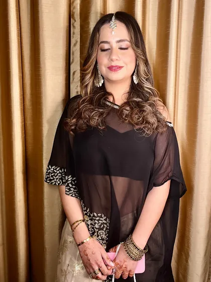 A candid moment, capturing her elegance and style.