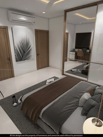 This kids' bedroom is simple and elegant, with neutral tones, clean lines, and abstract art. The mirrored wardrobe makes the space feel larger.