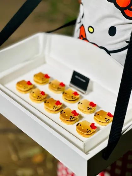 Adorable Hello Kitty-themed macarons created for a special collaboration. We love getting creative and tailoring our desserts to match any party theme.