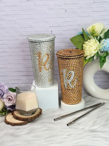 Add a touch of glamour to your daily hydration with my personalized bling tumblers. Available in sparkling silver and gold, these tumblers can be customized with an initial, making them a stylish and functional accessory.